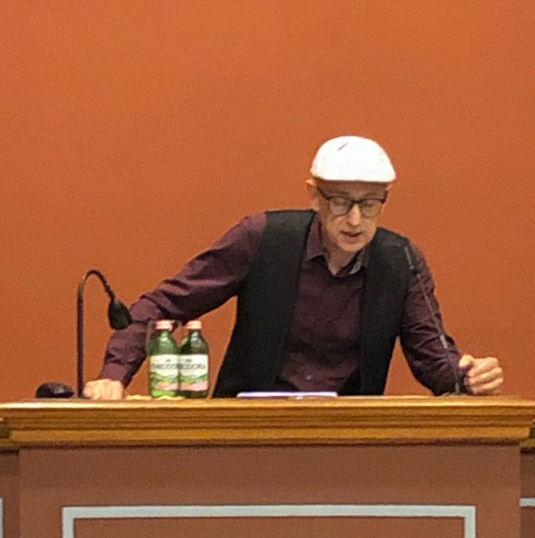 János Tőzser lecturing